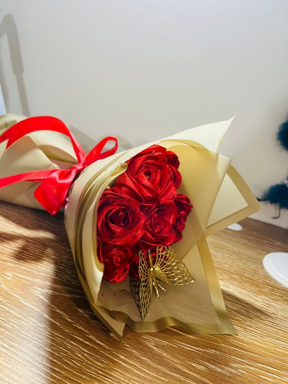 Red satin ribbon rose bouquet